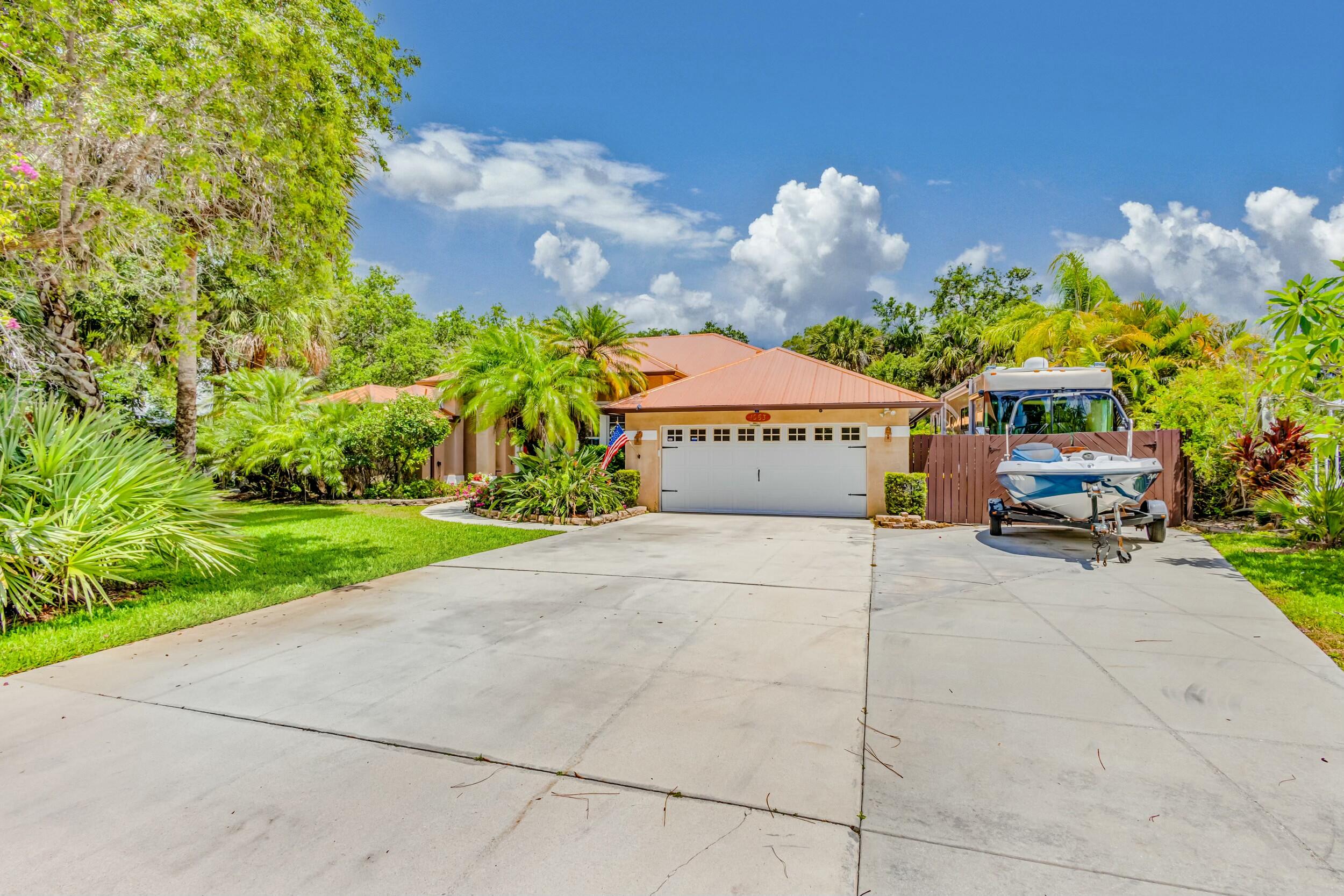 1063 Southwest Blue Water Way Stuart, FL 34997 - Photo 3 of 66 tempImage2V4XdK