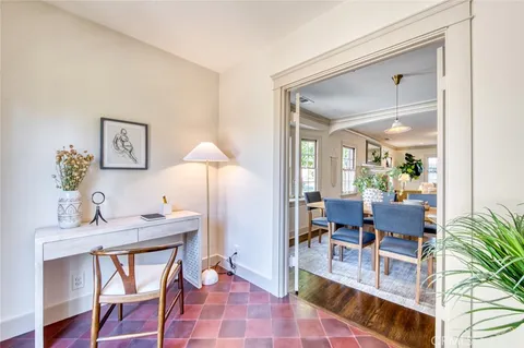 a living room with furniture and a table