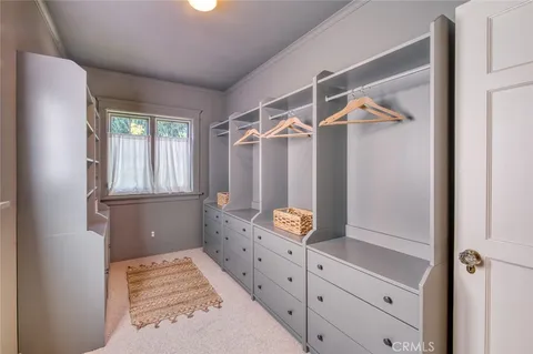 a bathroom with a double vanity sink mirror and