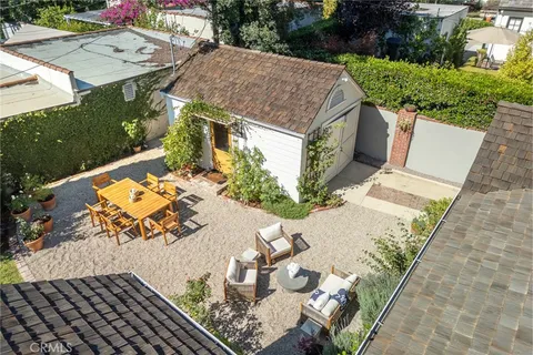 a house view with a outdoor seating space
