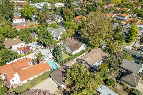 an aerial view of residential house and outdoor space