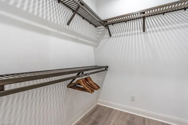 a view of a room with racks on the wall