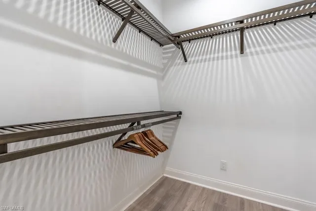 a view of a room with racks on the wall