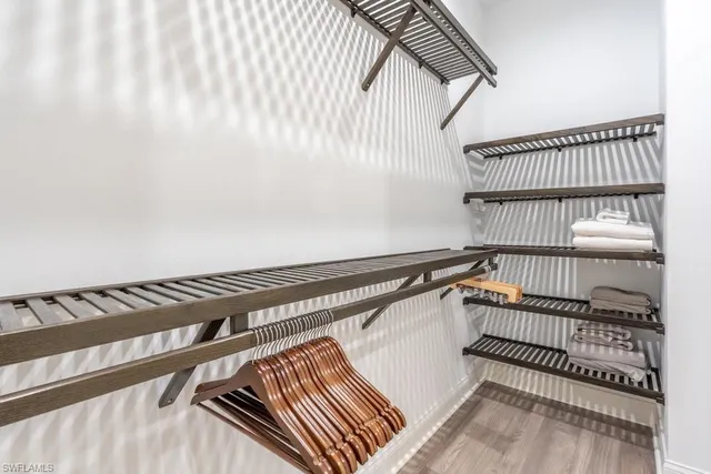 a view of a room with racks on the wall