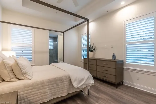 a bedroom with a bed and a dresser