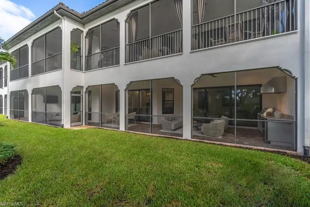 a view of house with yard