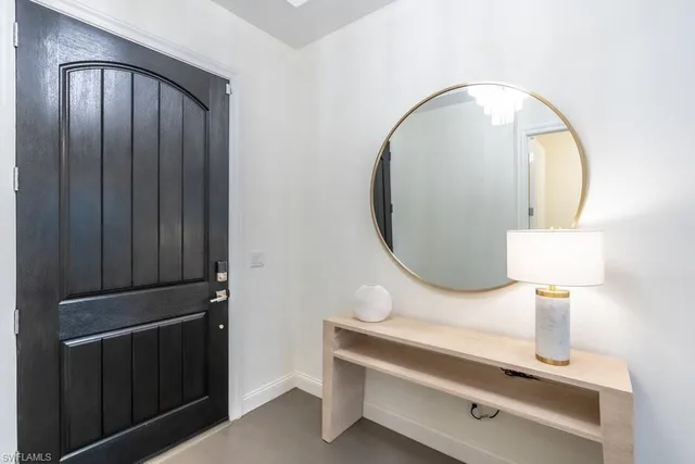 a close view of light fixtures and wood floor
