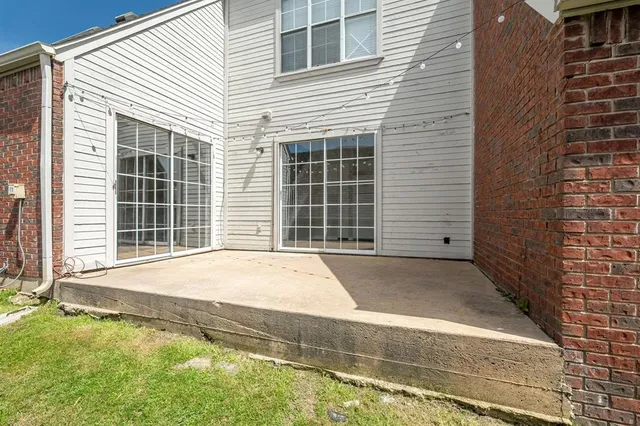 a front view of a house with a garage