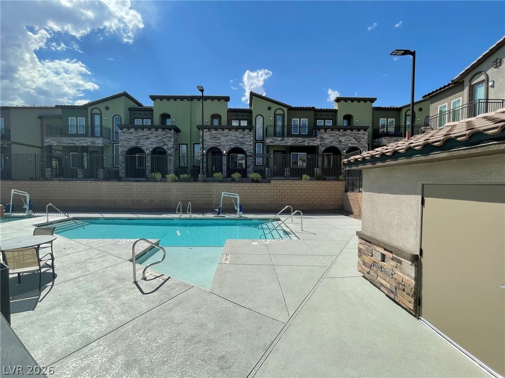 6444 Spring Jog Street Las Vegas, NV 89166 - Photo 8 of 13 This community pool area offers refreshing dips and relaxation under the sun.