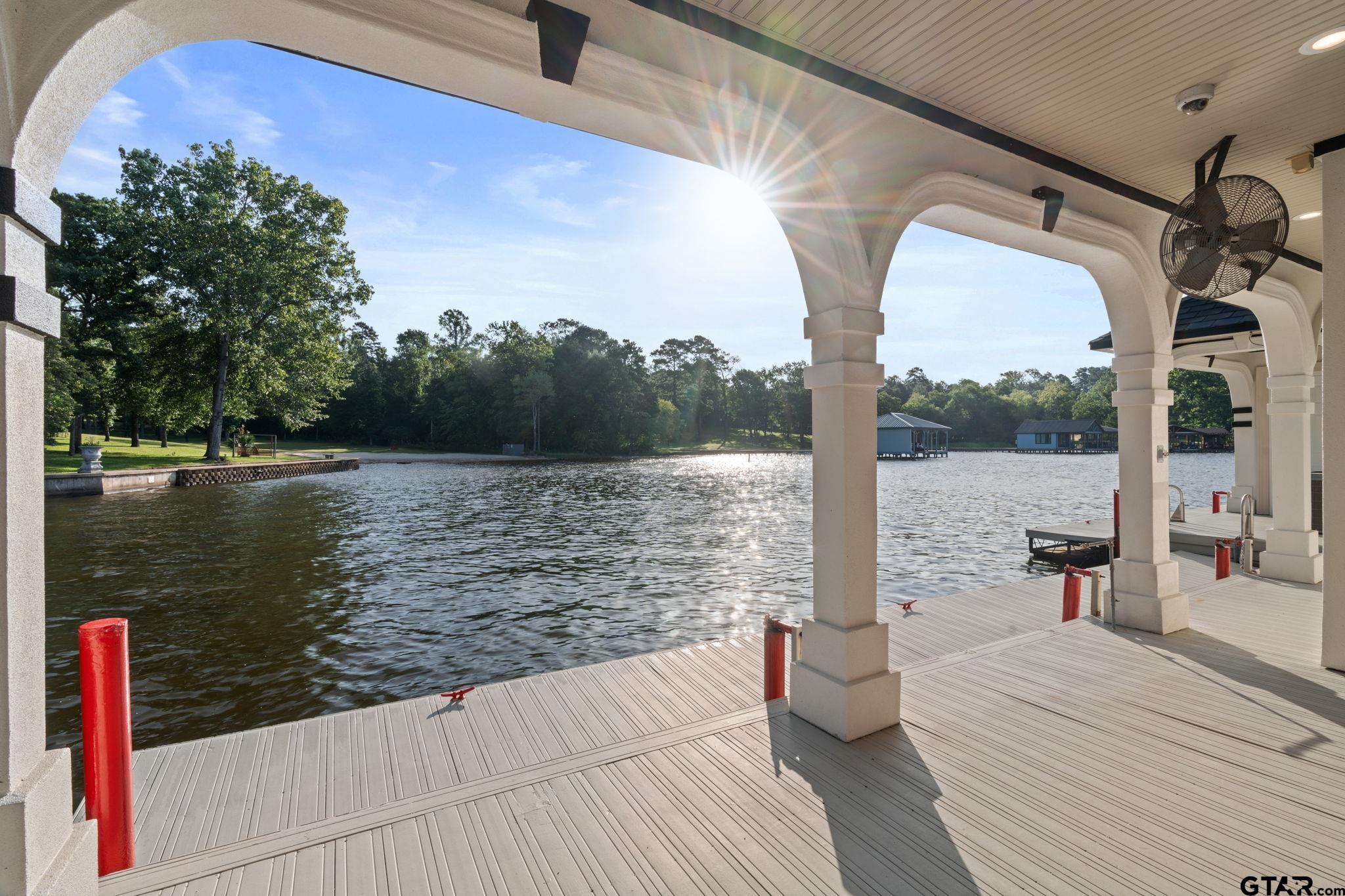 15996 Eastside Road Tyler, TX 75707 - Photo 27 of 48 a view of a lake from a balcony