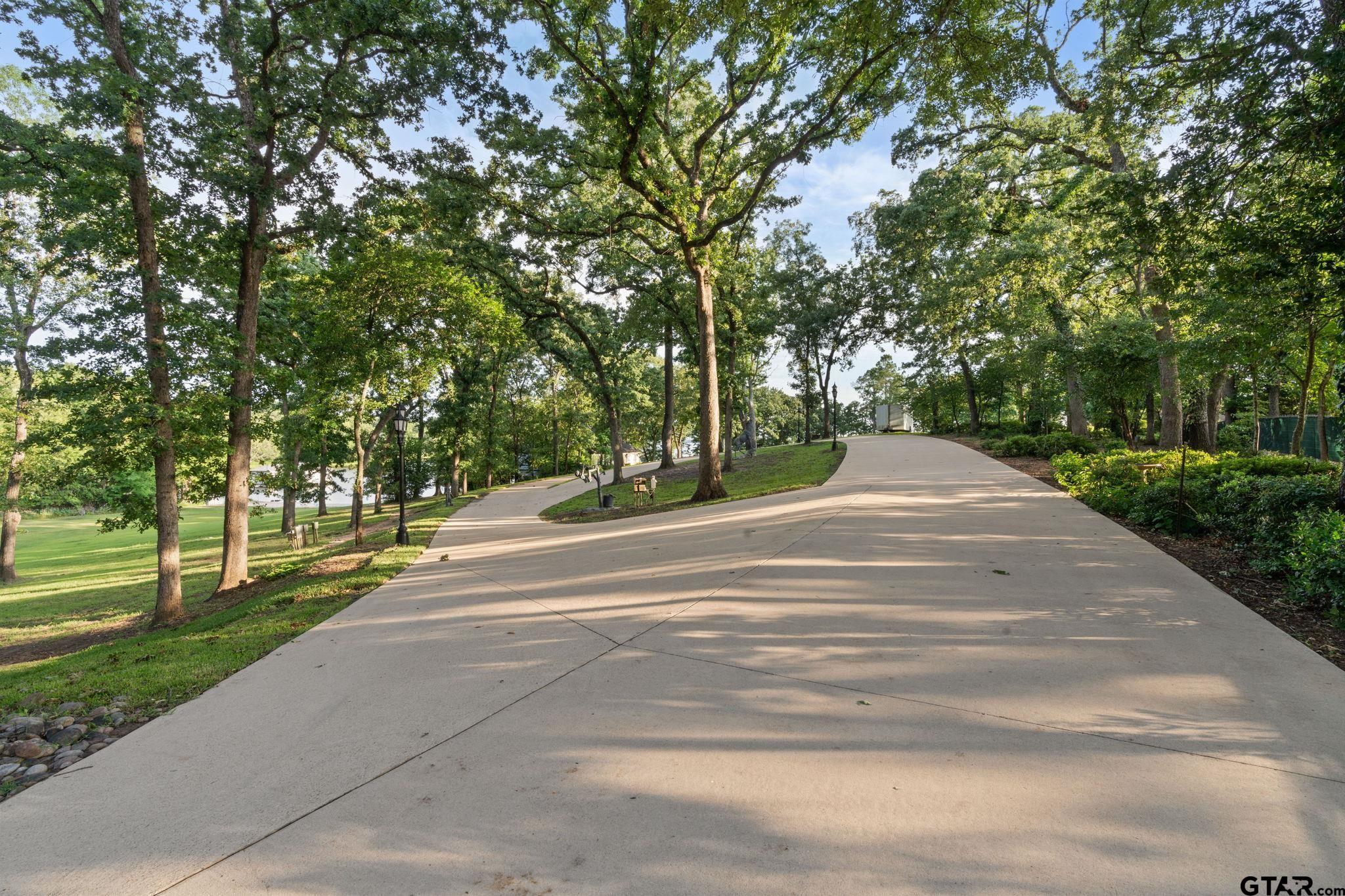 15996 Eastside Road Tyler, TX 75707 - Photo 40 of 48 a view of city street with a trees