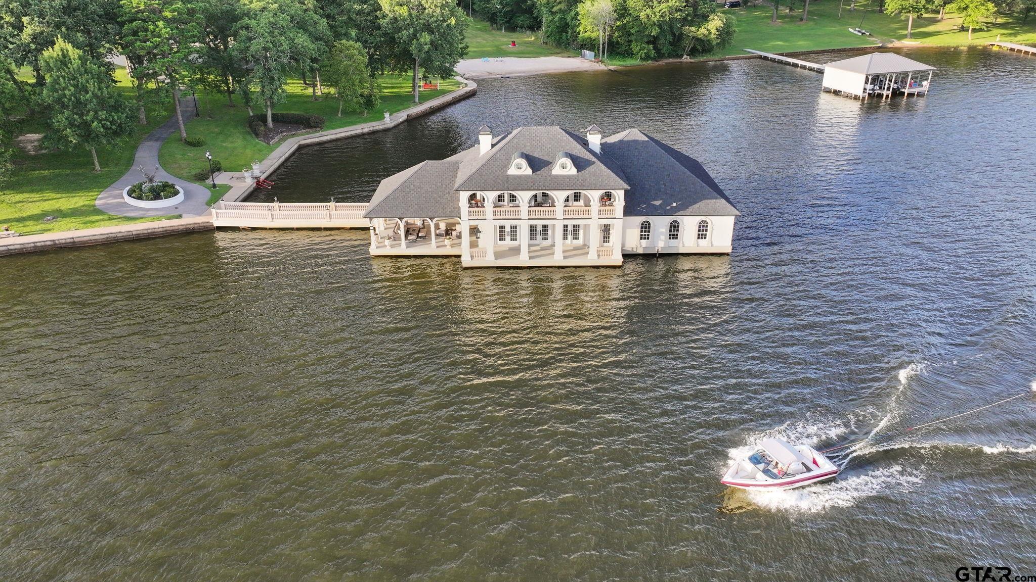 15996 Eastside Road Tyler, TX 75707 - Photo 46 of 48 a view of a water pond with green space