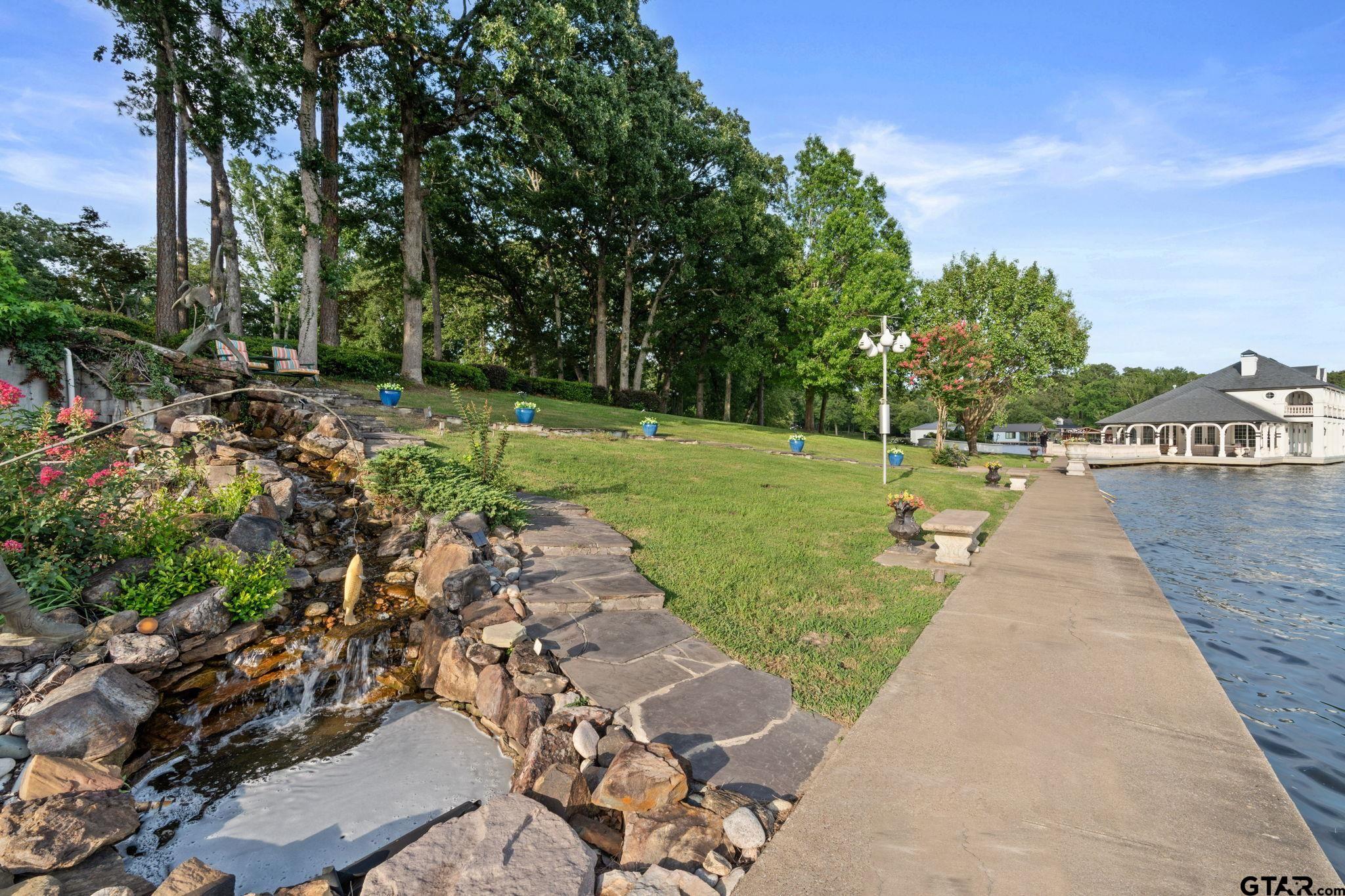 15996 Eastside Road Tyler, TX 75707 - Photo 8 of 48 a view of a park with large trees