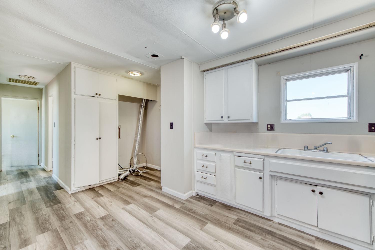 3658 South Butte Avenue Kerman, CA 93630 - Photo 17 of 20 a spacious bathroom with a double vanity sink a mirror and a shower
