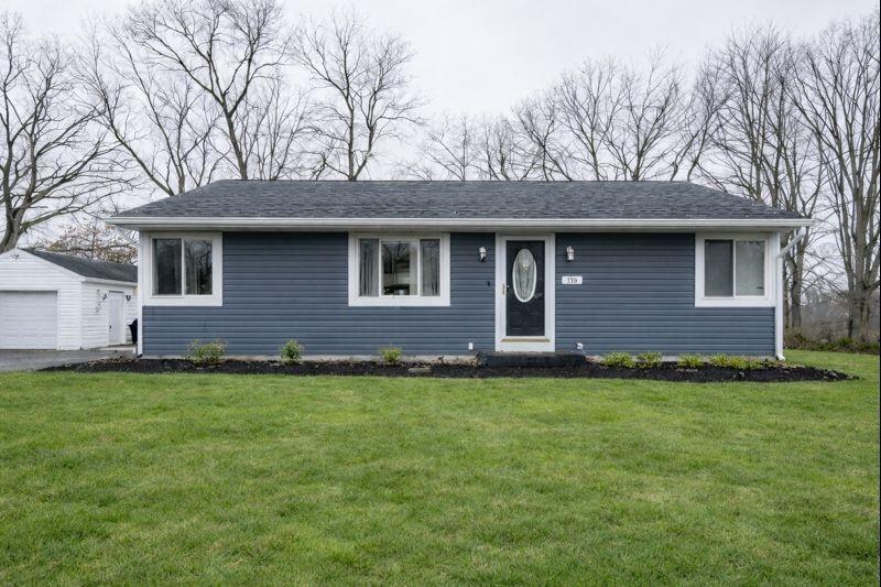 114 Dolphin Drive Butler, PA 16002 - Photo 1 of 25 a brick house with a yard