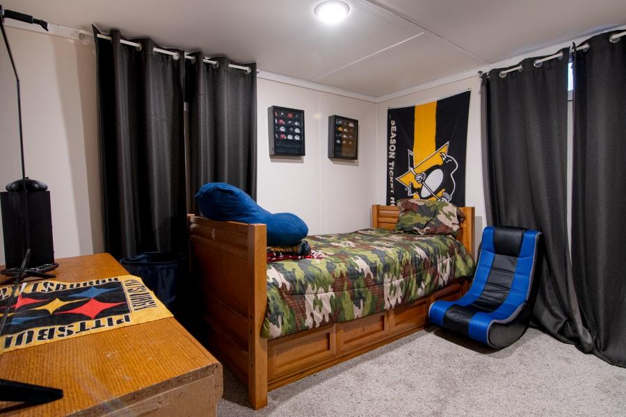 114 Dolphin Drive Butler, PA 16002 - Photo 12 of 25 a bed room with a bed and a window