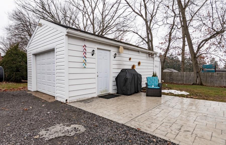 114 Dolphin Drive Butler, PA 16002 - Photo 23 of 25 a view of a house with a yard and garage