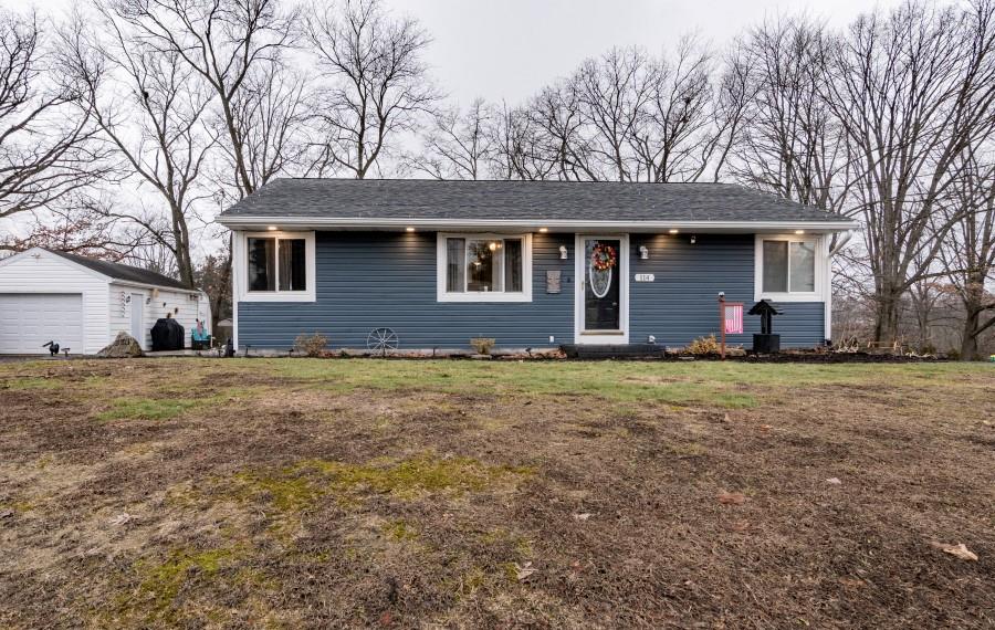114 Dolphin Drive Butler, PA 16002 - Photo 25 of 25 a front view of a house with a garden