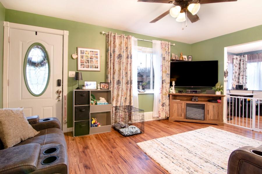 114 Dolphin Drive Butler, PA 16002 - Photo 3 of 25 a living room with furniture and a flat screen tv