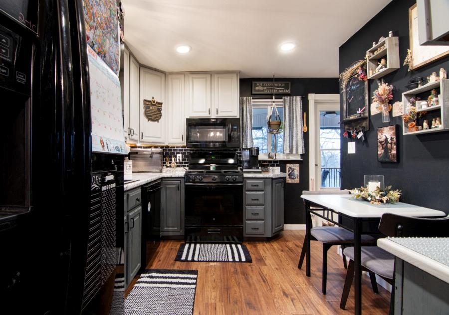 114 Dolphin Drive Butler, PA 16002 - Photo 4 of 25 a kitchen with stainless steel appliances a dining table chairs stove refrigerator and cabinets