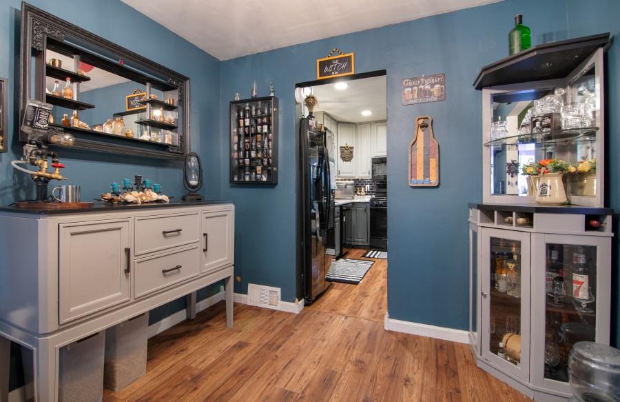 114 Dolphin Drive Butler, PA 16002 - Photo 7 of 25 a very nice looking room with wooden floor and furniture