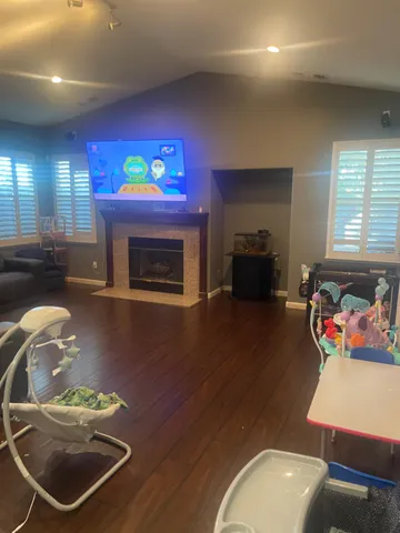 a kitchen with stainless steel appliances a stove a sink a microwave and cabinets