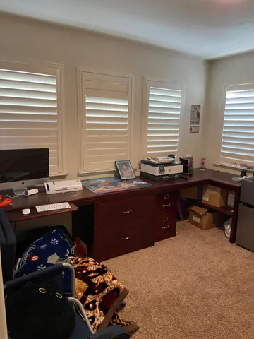 a bathroom with a sink and a large mirror