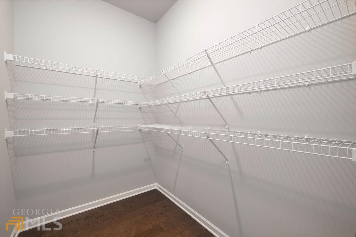 1908 Endress Circle Hampton, GA 30228 - Photo 16 of 44 a view of a room with racks on the wall