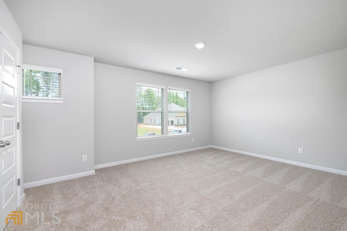 1908 Endress Circle Hampton, GA 30228 - Photo 30 of 44 an empty room with windows