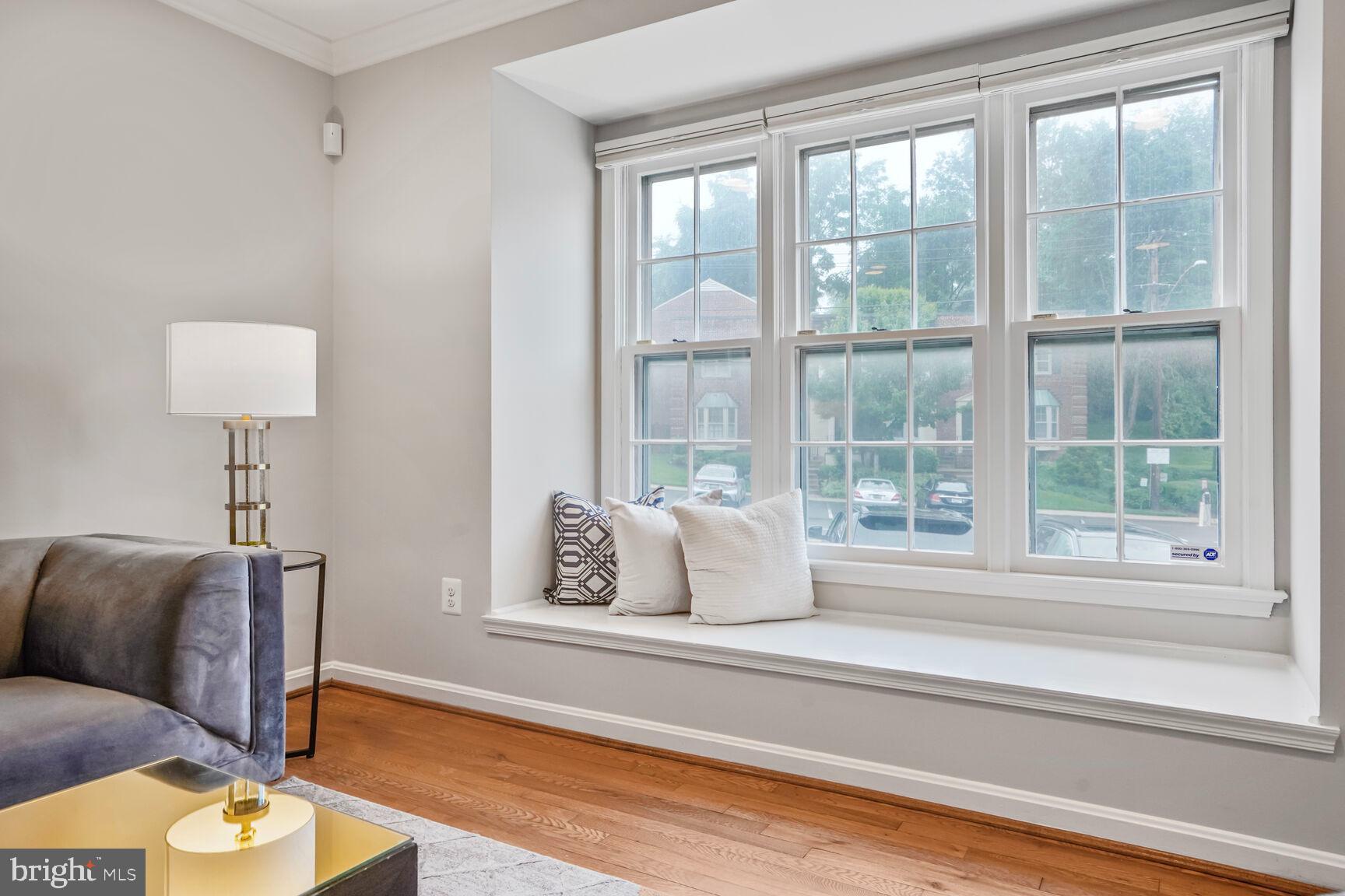 6630 Hillandale Road, Unit 56 Chevy Chase, MD 20815 - Photo 12 of 40 a living room with furniture and a window