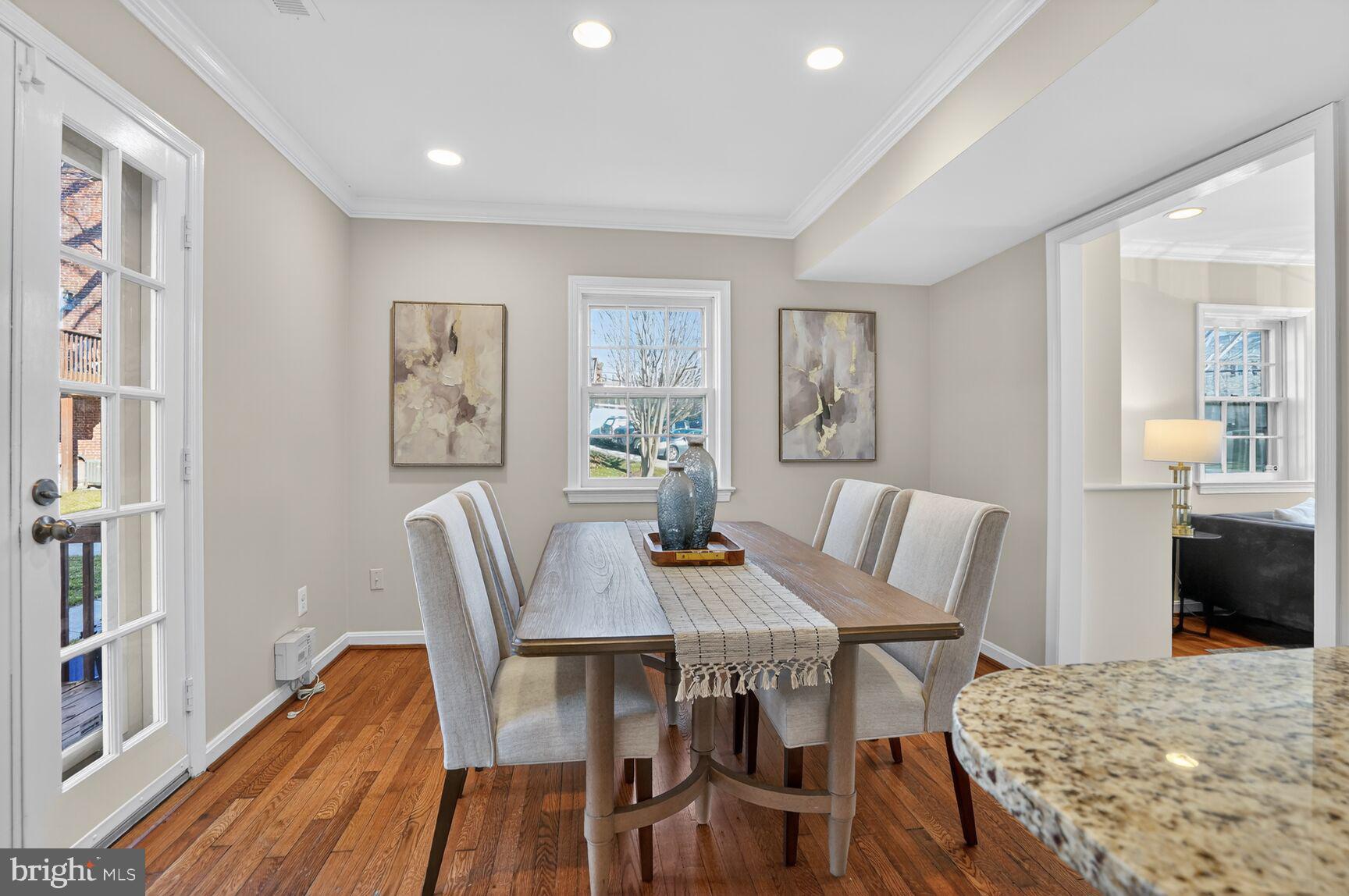 6630 Hillandale Road, Unit 56 Chevy Chase, MD 20815 - Photo 16 of 40 a view of a dining room with furniture