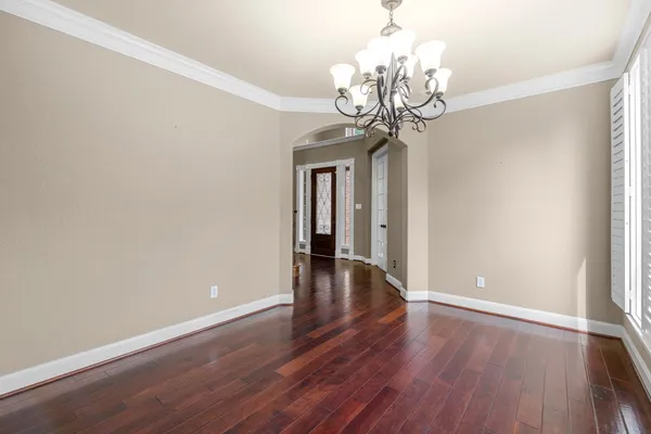 a view of a livingroom with wooden floor