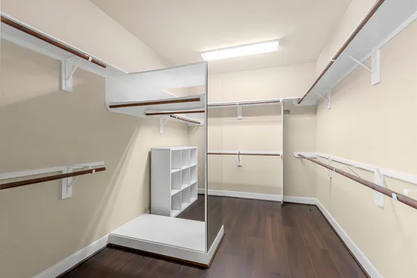 a view of an empty walk in closet