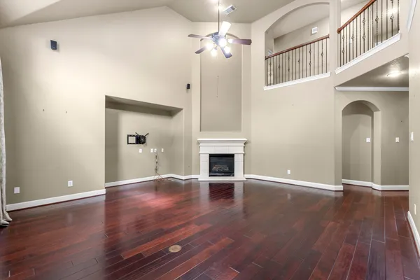 wooden floor chandelier and glass door