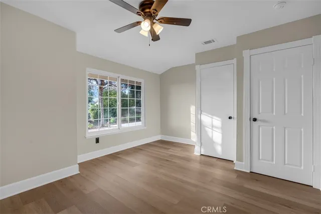 a view of a swimming pool with a chairs
