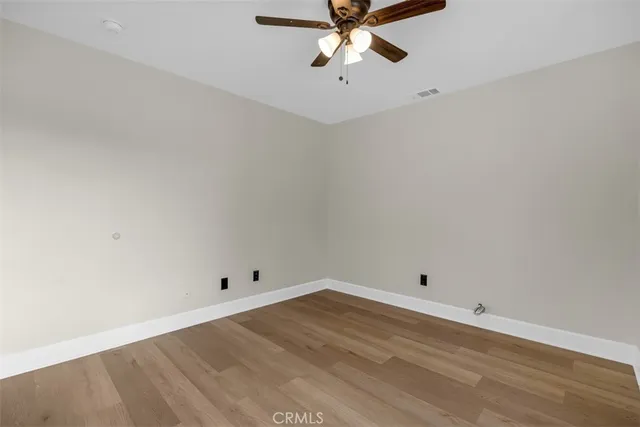 a view of a house with swimming pool and sitting area