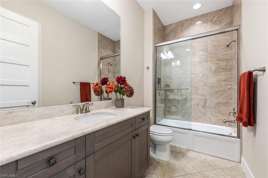 6931 Cay Court Naples, FL 34113 - Photo 13 of 24 Office with ceiling fan and light colored carpet