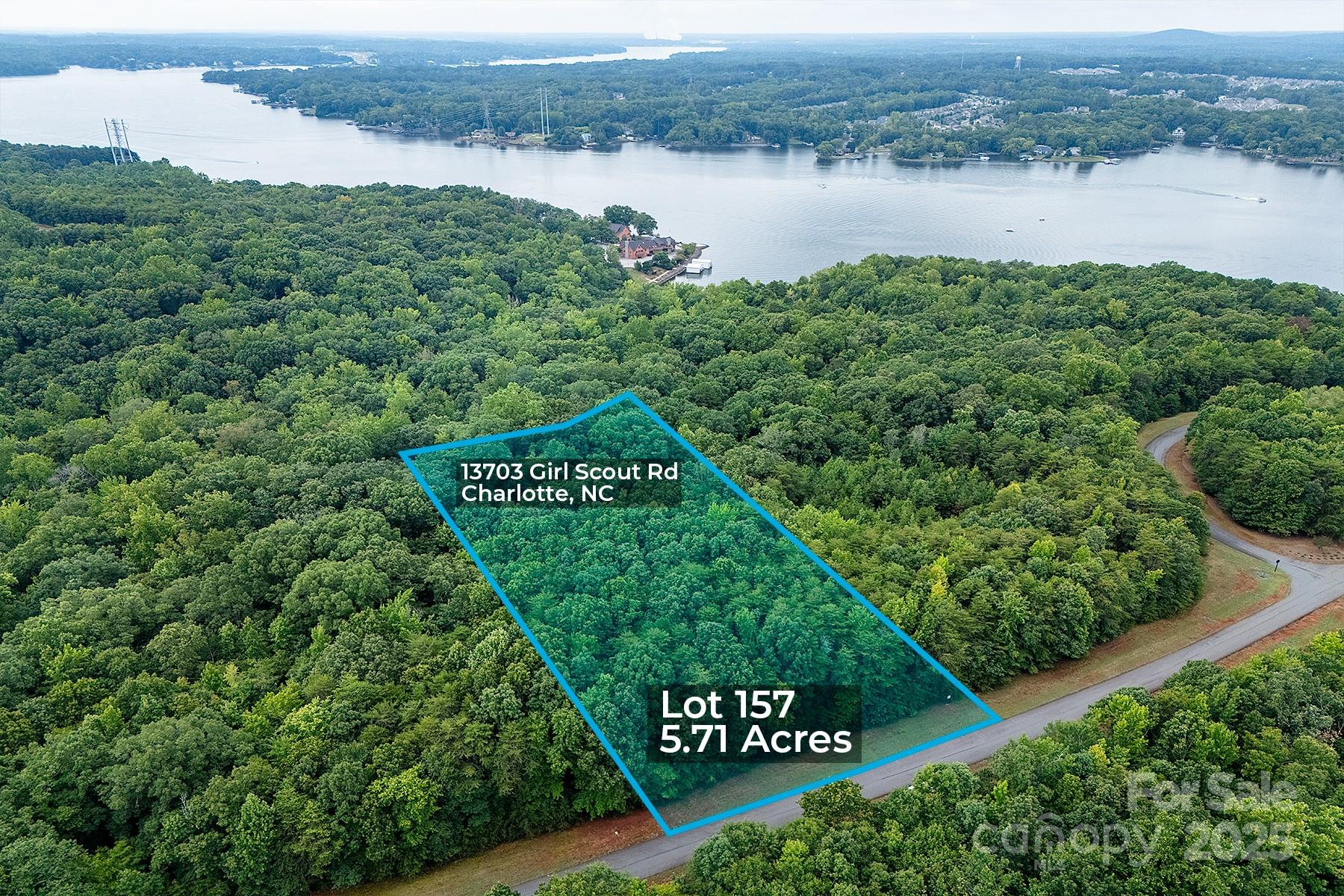 13703 Girl Scout Road, Unit 157 Charlotte, NC 28278 - Photo 1 of 23 a view of a sign of a river and a lake view