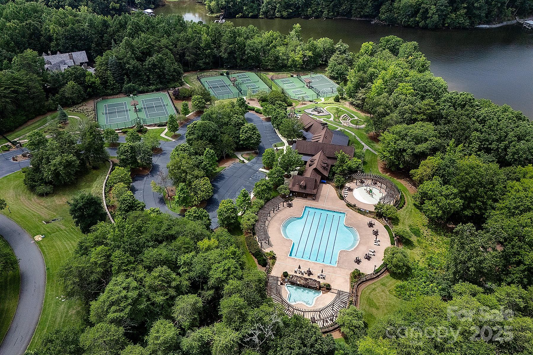 13703 Girl Scout Road, Unit 157 Charlotte, NC 28278 - Photo 15 of 23 an aerial view of a house with outdoor space and lake view