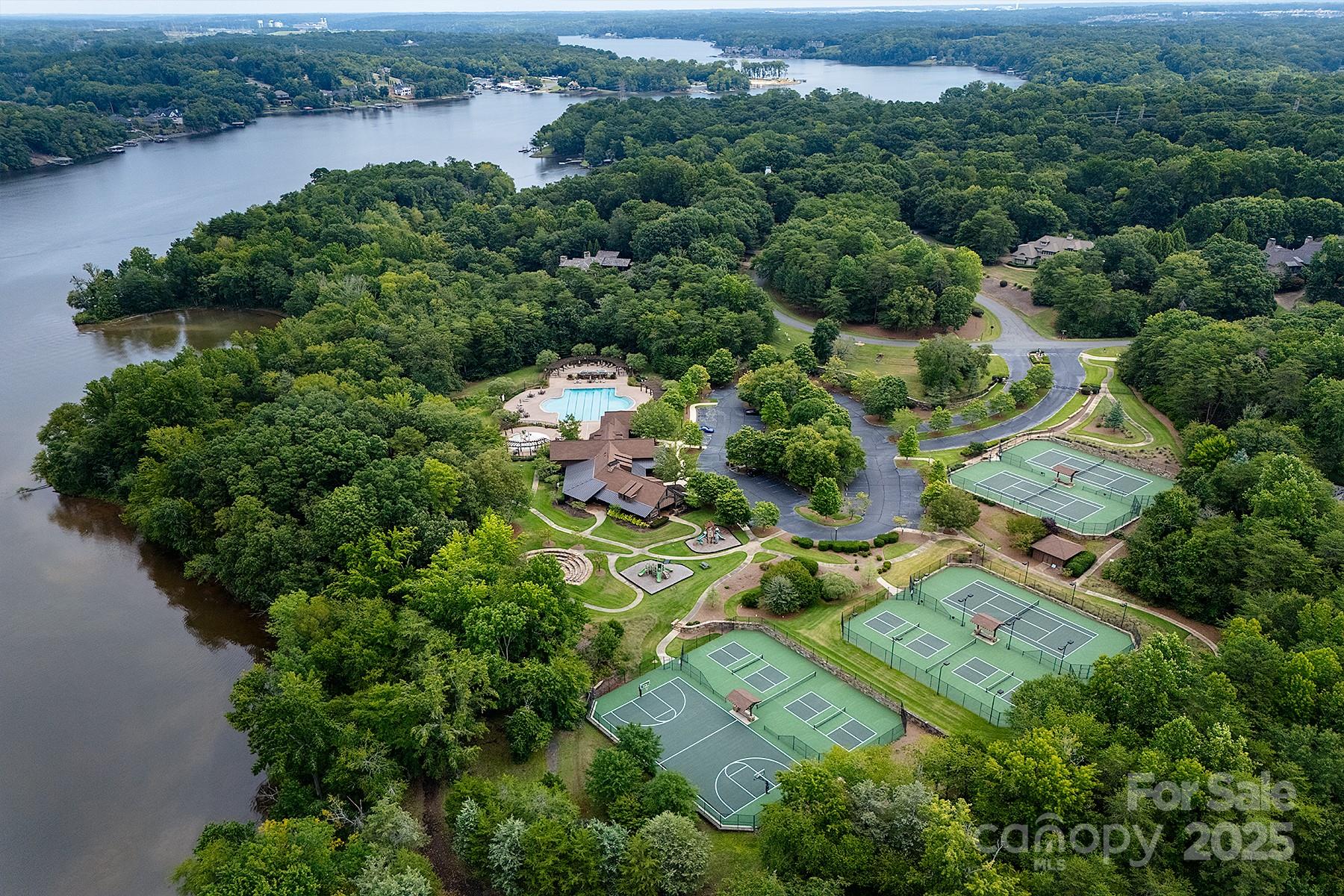 13703 Girl Scout Road, Unit 157 Charlotte, NC 28278 - Photo 21 of 23 an aerial view of residential house with outdoor space and river all around