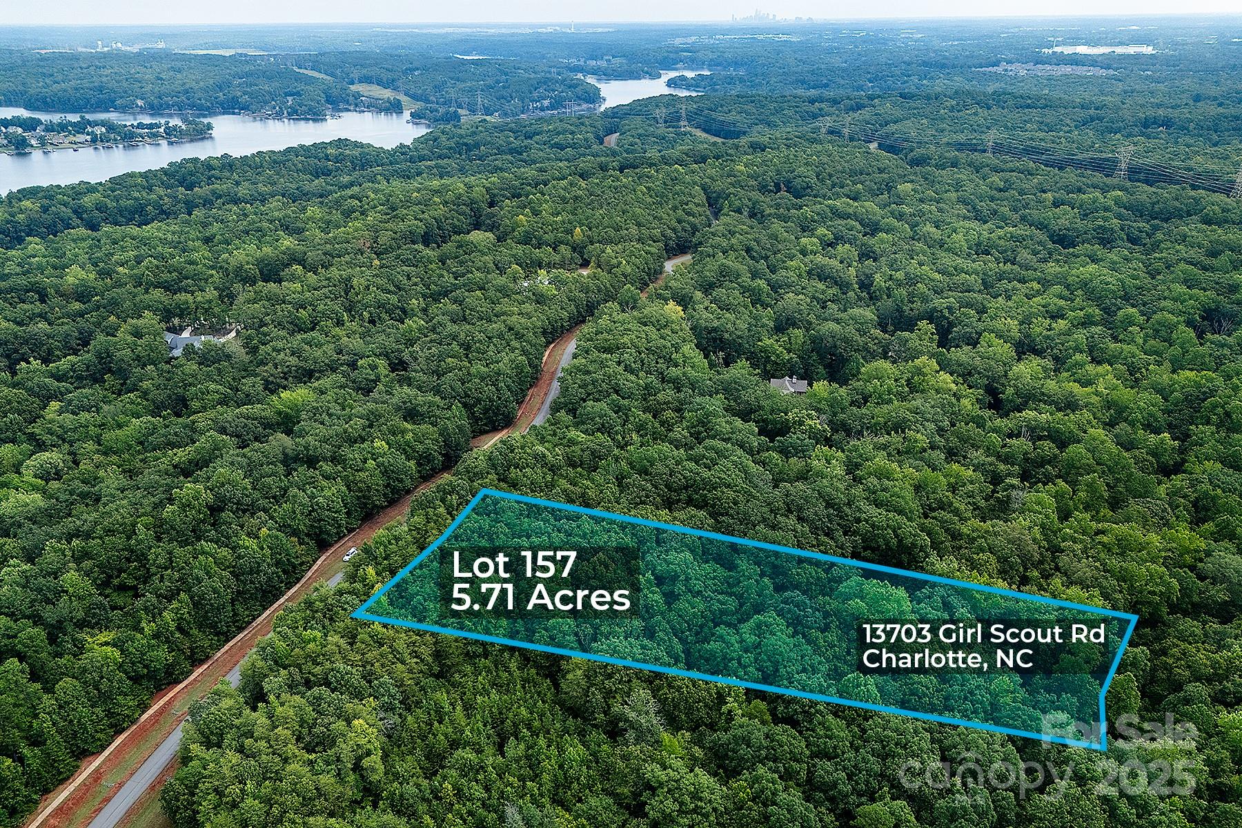 13703 Girl Scout Road, Unit 157 Charlotte, NC 28278 - Photo 6 of 23 an view of a street with a park