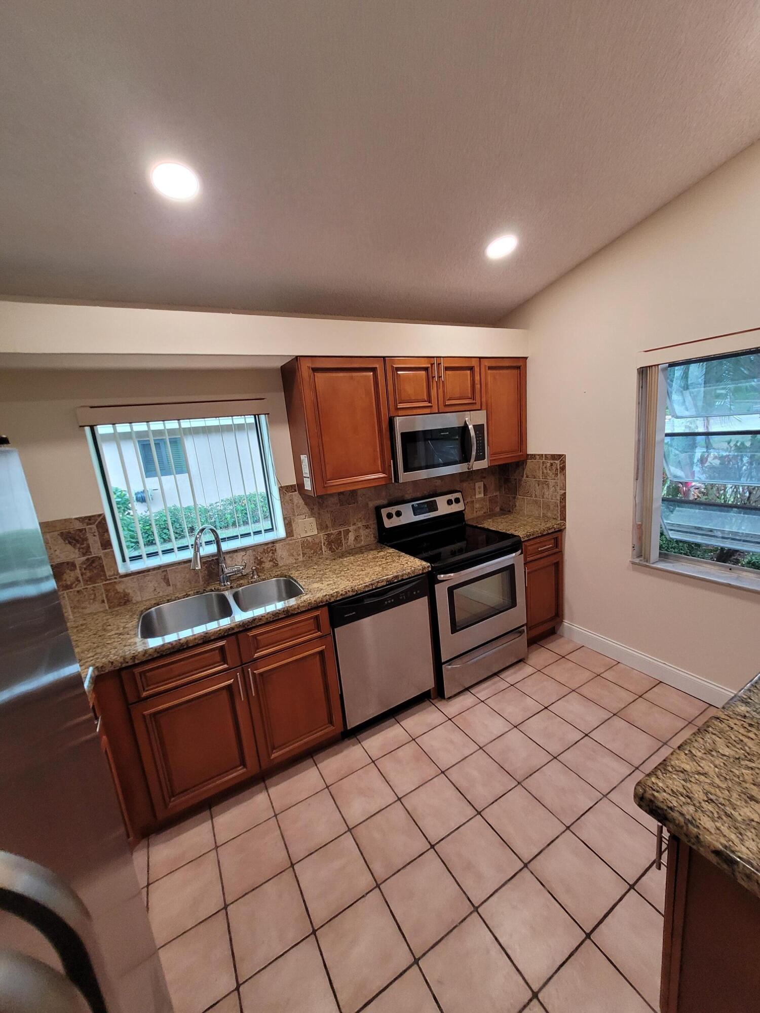 8065 Springtree Road Boca Raton, FL 33496 - Photo 6 of 52 20230204_111208