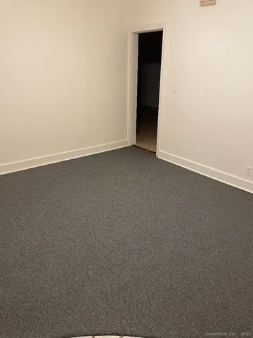 an empty room with an empty room