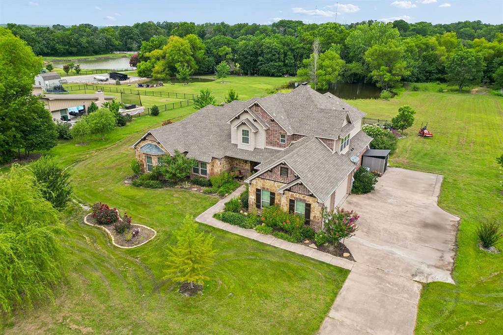62 Trail Ridge Drive Melissa, TX 75454 - Photo 2 of 39 Beautiful home on 5 acres with a pond, creek, fruit trees and garden with irrigation
