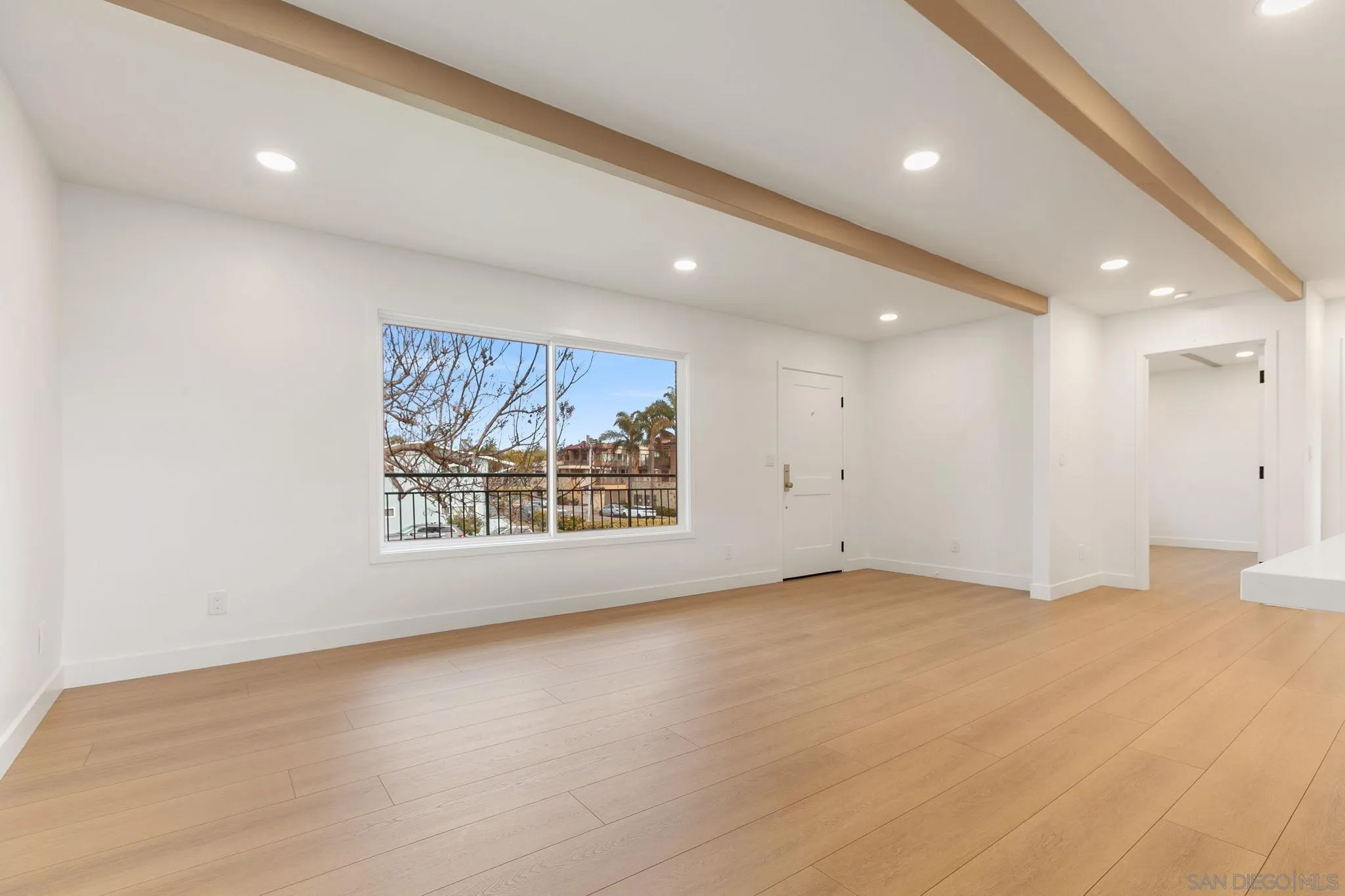 210 A Street, Unit 9 Encinitas, CA 92024 - Photo 9 of 41 an empty room with a large window