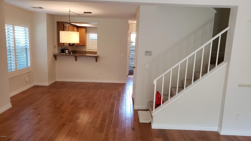 2731 Erringer Road, Unit 71 Simi Valley, CA 93065 - Photo 15 of 45 a view of entryway and hall with wooden floor