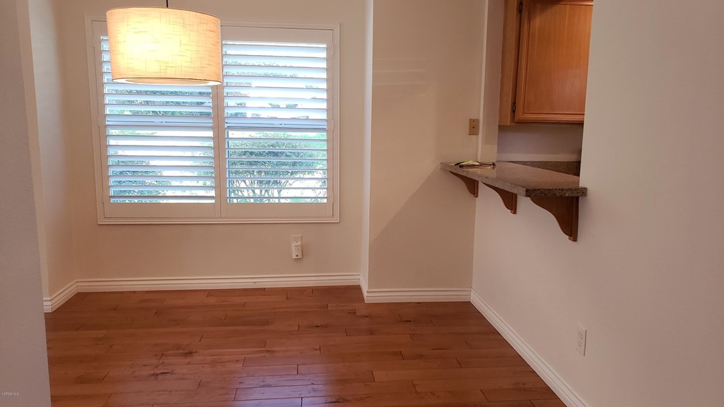 2731 Erringer Road, Unit 71 Simi Valley, CA 93065 - Photo 17 of 45 a view of a room with rack on the wall and a window