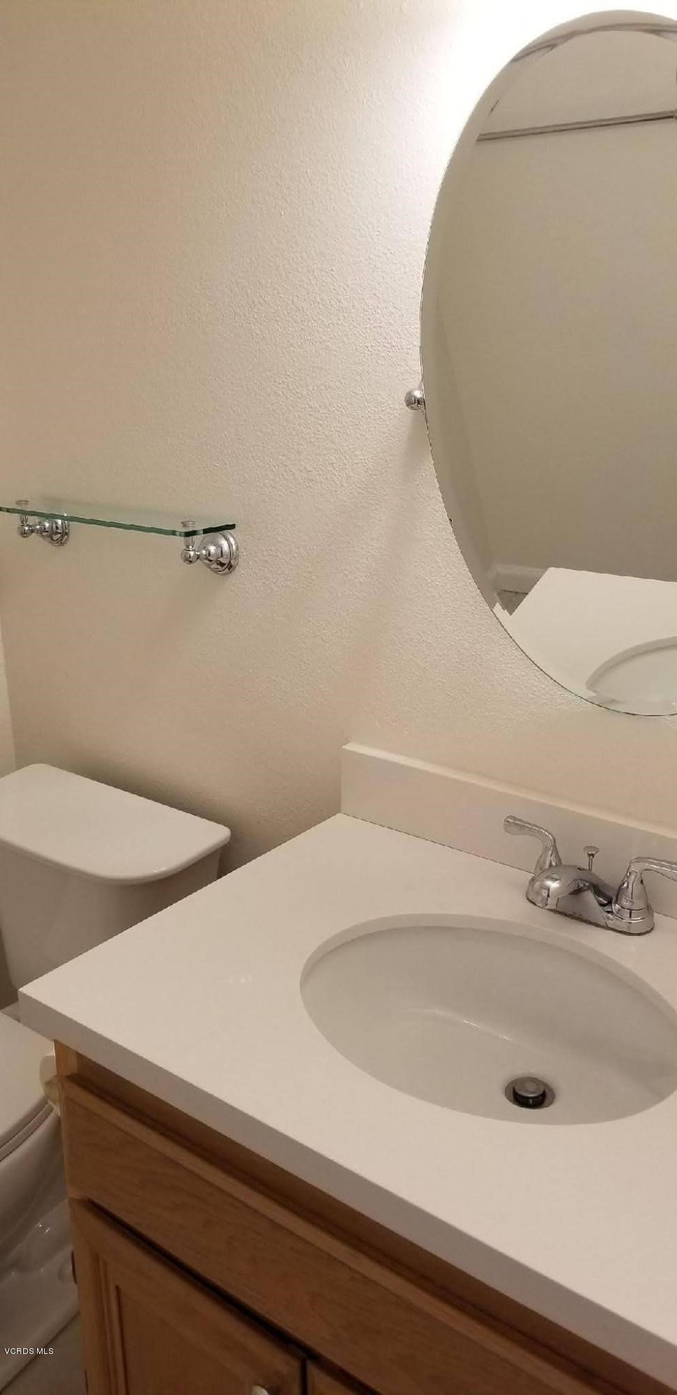 2731 Erringer Road, Unit 71 Simi Valley, CA 93065 - Photo 24 of 45 a bathroom with a sink and toilet