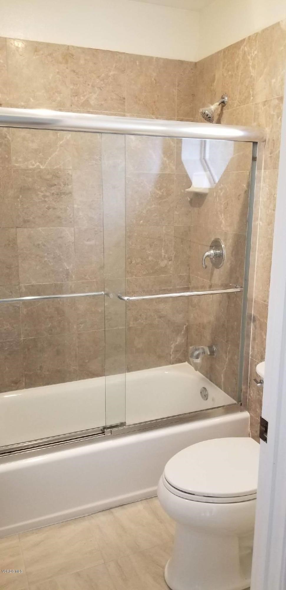 2731 Erringer Road, Unit 71 Simi Valley, CA 93065 - Photo 36 of 45 a bathroom with a shower and a toilet