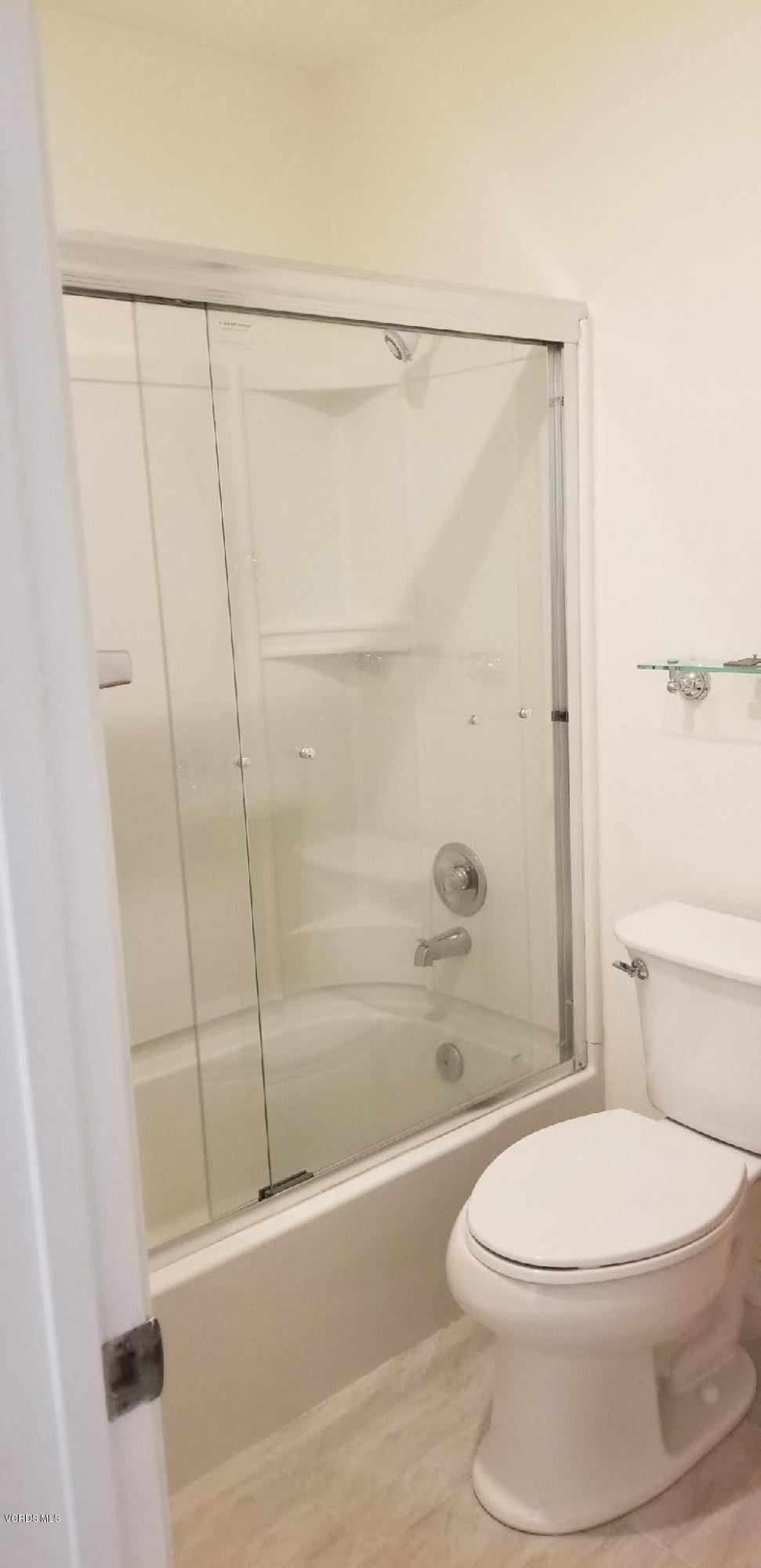 2731 Erringer Road, Unit 71 Simi Valley, CA 93065 - Photo 38 of 45 a bathroom with a toilet and a shower